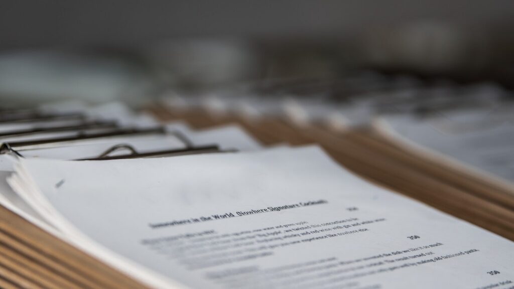 restaurant menus on clipboards close up