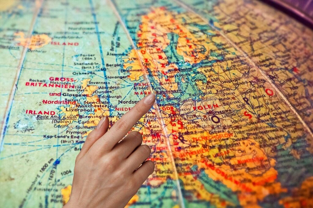 map, globe, world, earth, plan, show, finger, hand, vacations, to travel, goal, trip, round, continent, countries, open, explore, new, world map, multicultural, discover, people, evening expensive, abroad