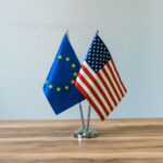 European union and us flags on a table